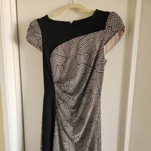 EUC Gorgeous Asymmetrical Black Dress size S=(XXS)